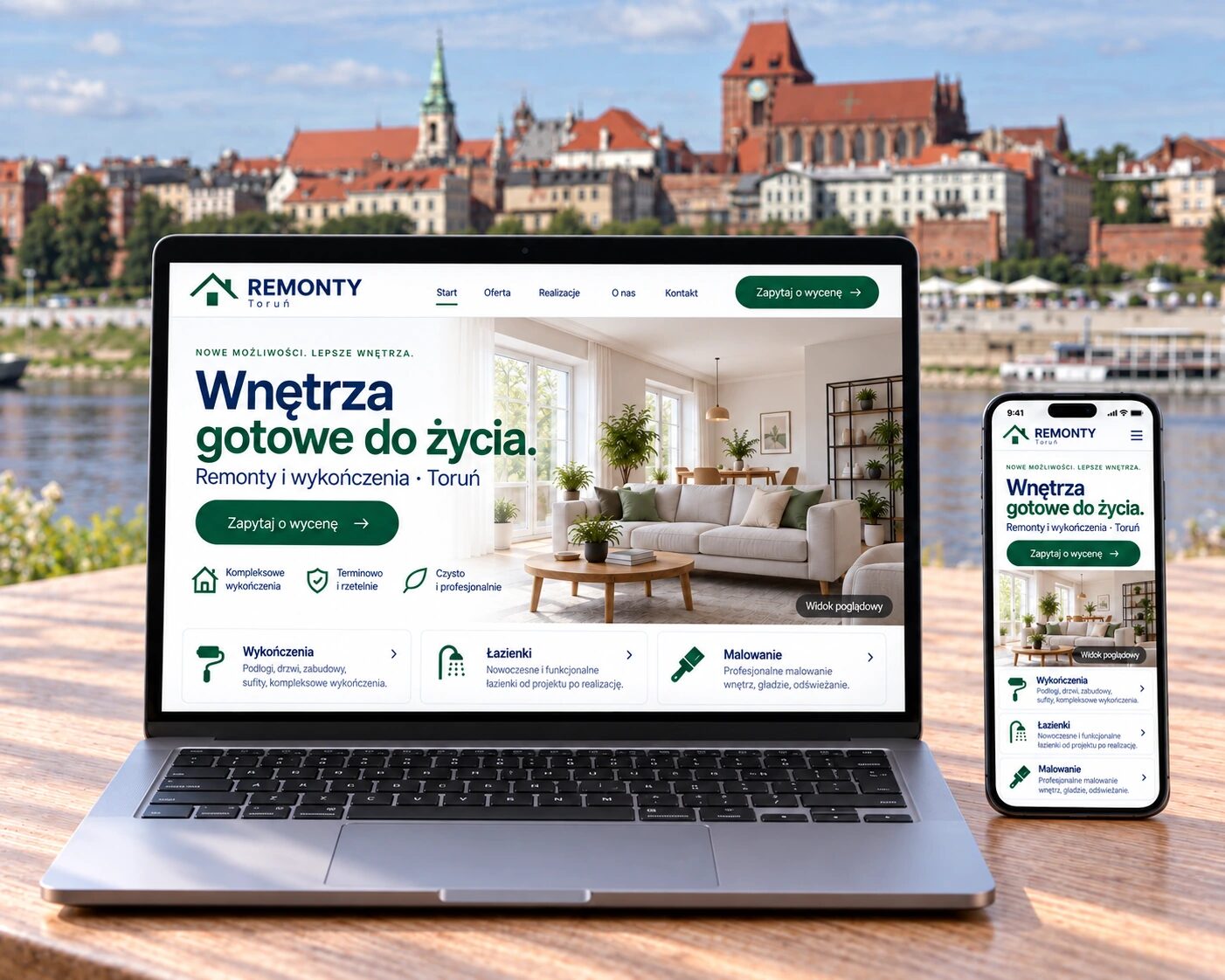 Przykładowa strona firmy remontowej na laptopie i telefonie, na tle panoramy Torunia nad Wisłą.